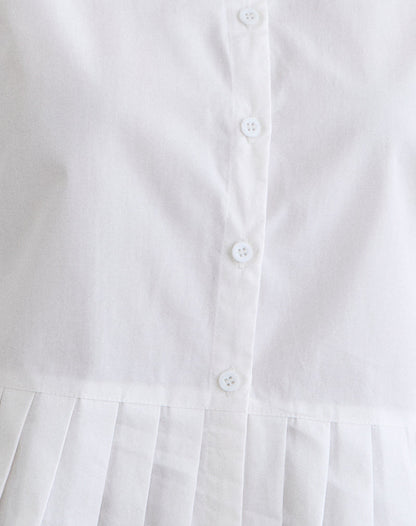 Bisian Pleated Hem Shirt in Poplin White